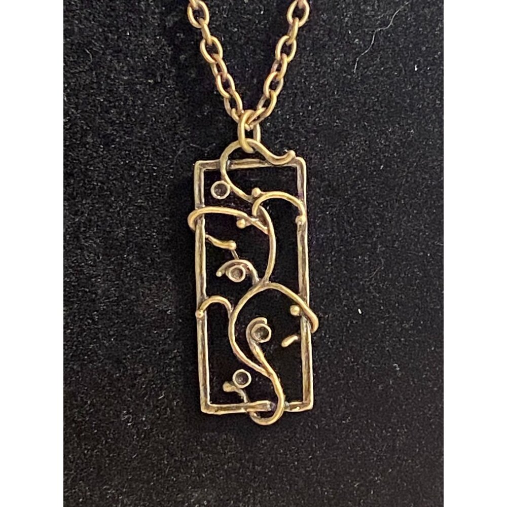 Handcrafted Artistic Pendant Necklace With Intricate Design On Brass Chain